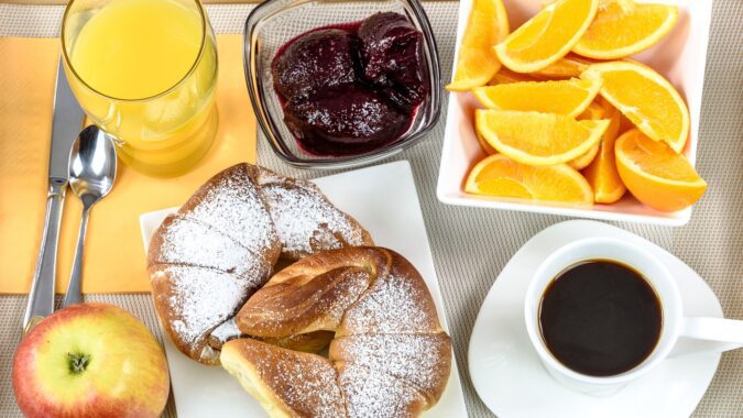 hotel breakfast on a tray.