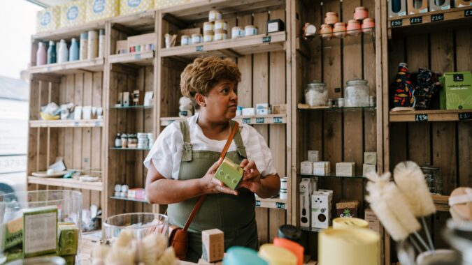 woman working in a zero waste shop.