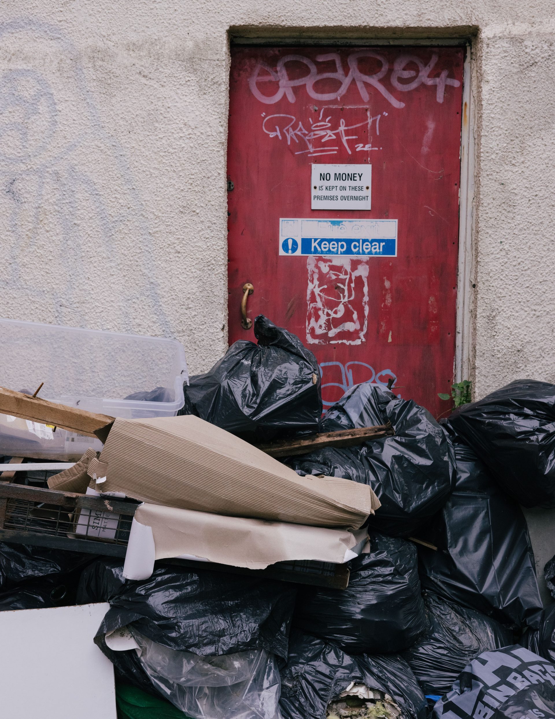 black bags in alley
