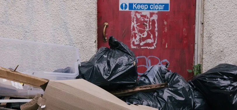 black bags in alley