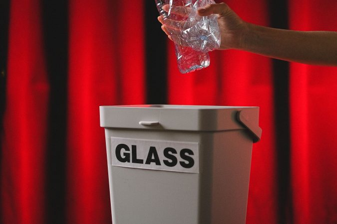 plastic going in glass recycling bin